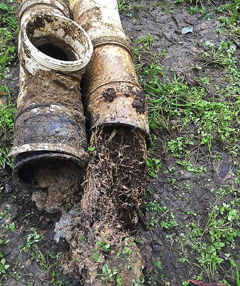 A badly blocked drainage pipe
